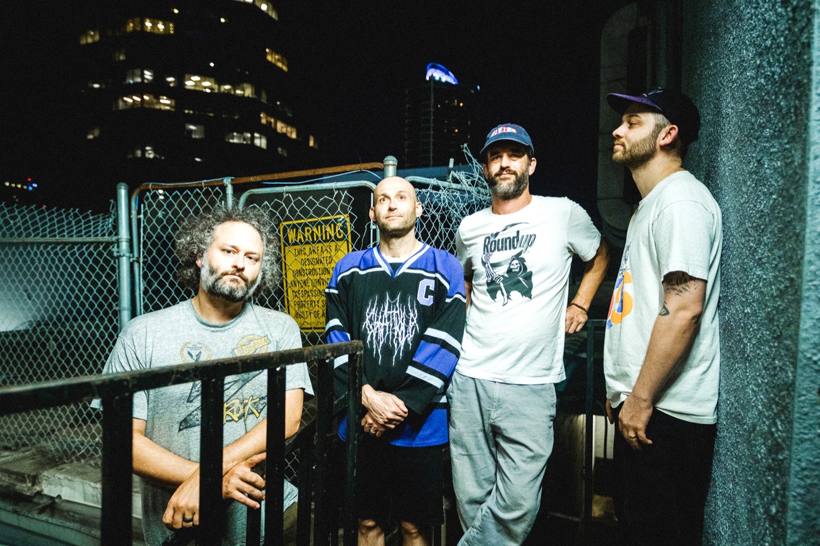 Chat Pile in a 2025 promotional group photograph by Matthew Zagorski.